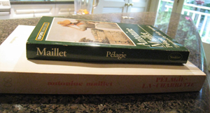 French and English copies of Pélagie-la-Charrette by Antonine Maillet