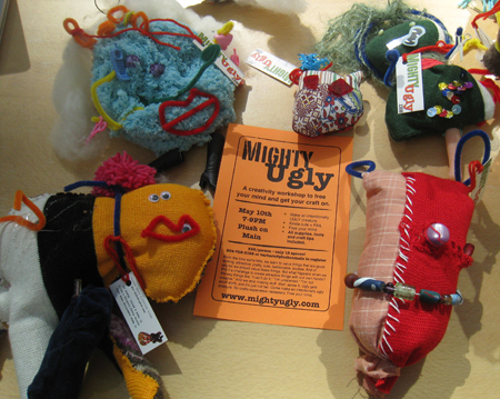 Mighty ugly critters posing with poster