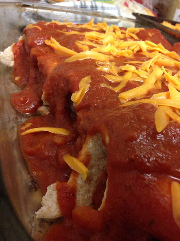 Enchiladas smothered in sauce